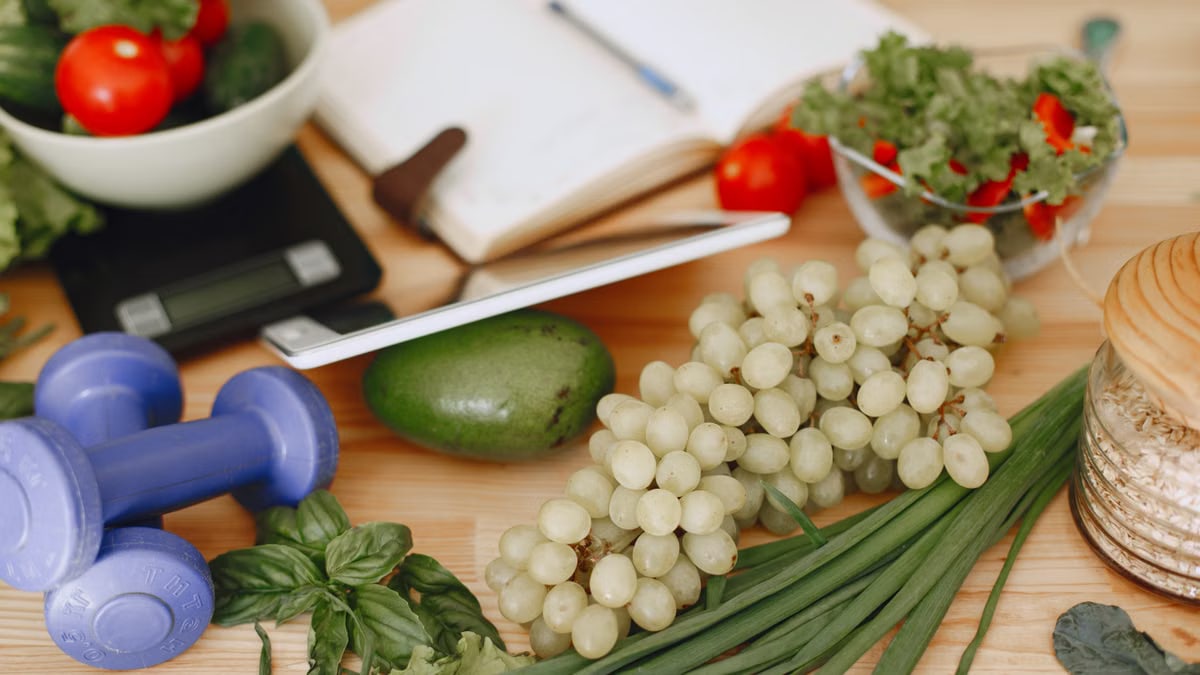 A vibrant composition of fruits, vegetables, and fitness items promoting a healthy lifestyle.